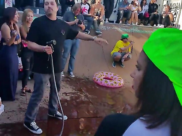 Wet amateur chicks go topless in public