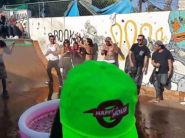 Wet amateur chicks go topless in public