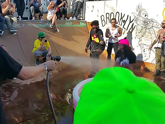 Wet amateur chicks go topless in public