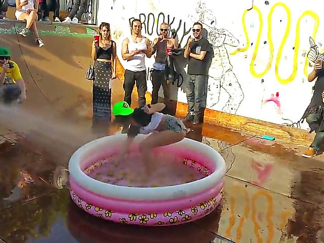 Wet amateur chicks go topless in public