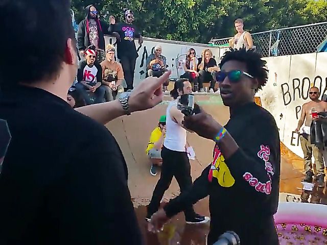 Wet amateur chicks go topless in public