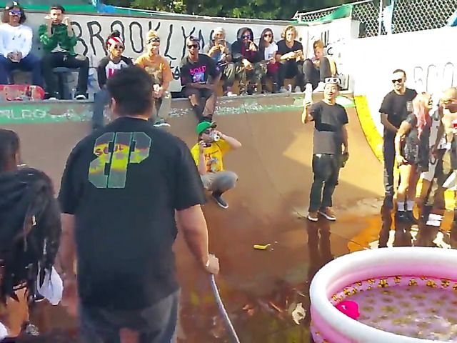 Wet amateur chicks go topless in public