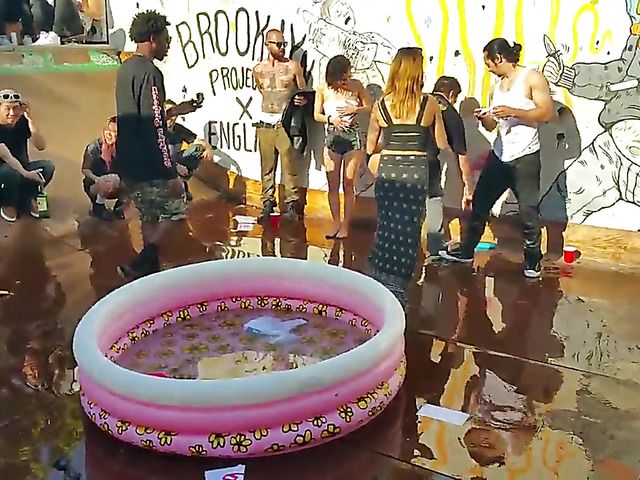 Wet amateur chicks go topless in public