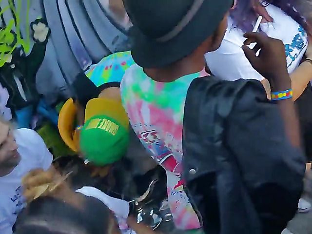 Wet amateur chicks go topless in public