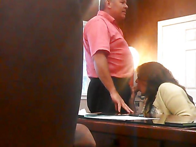 Quick blowjob in the office on camera