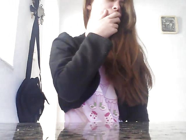 Kinky girl playing with feet