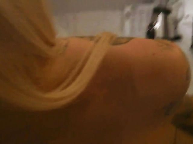 Tattooed amateur babe with giant boobs fucked in the kitchen