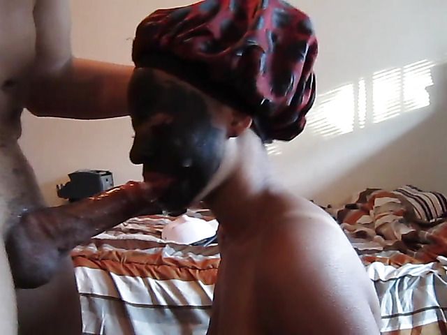 Naked ebony GF with dirty face sucking cock