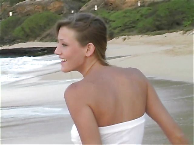 Amateur girl with perfect boobs goes topless on the beach