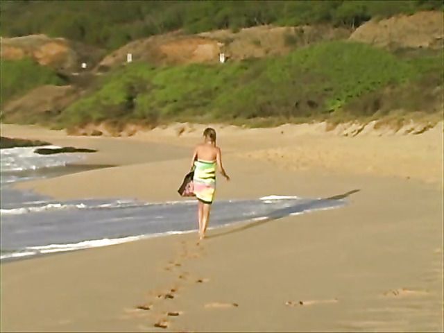 Amateur girl with perfect boobs goes topless on the beach