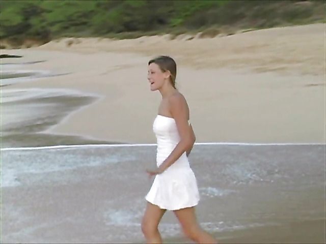 Amateur girl with perfect boobs goes topless on the beach