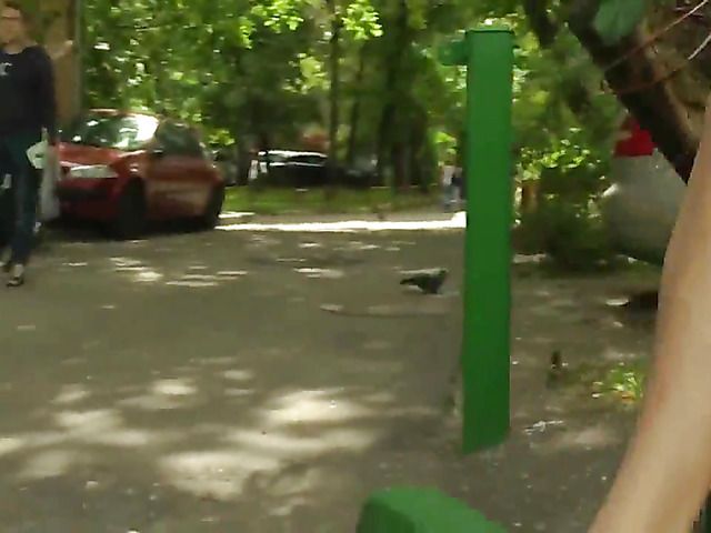 Barefoot amateur with dirty soles in the street