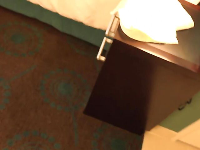 Short haired MILF is proud of her huge boobs