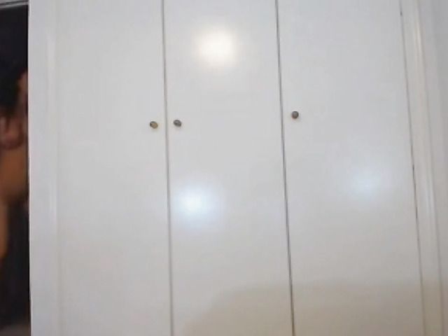 Naked goth girl with black lips flaunts her big tits