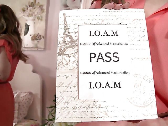 Big titted temptress in specs posing in lingerie