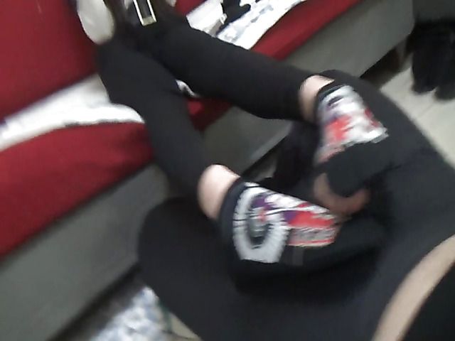 Japanese girl in black socks gives a footjob