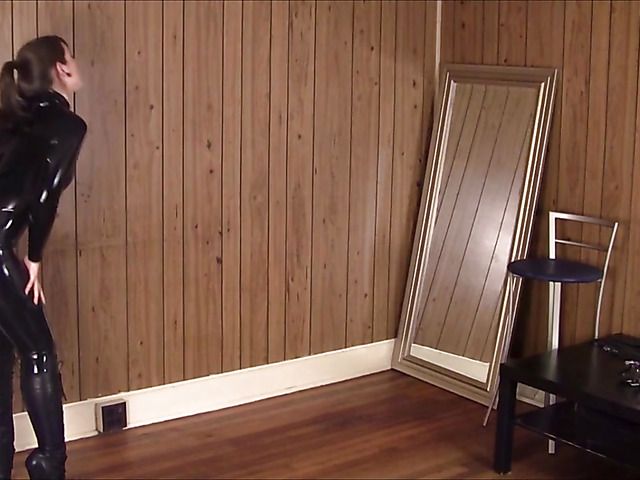 Sexy latex girl in black getting hogtied