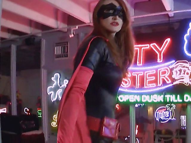 Sexy batgirl Kendra James striptease and bondage