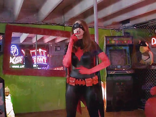 Sexy batgirl Kendra James striptease and bondage