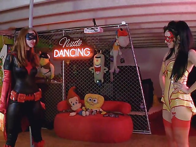 Sexy batgirl Kendra James striptease and bondage