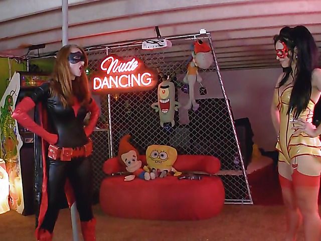 Sexy batgirl Kendra James striptease and bondage