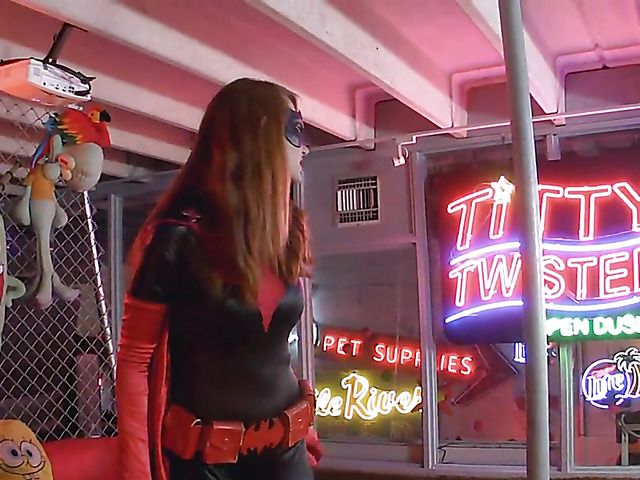 Sexy batgirl Kendra James striptease and bondage