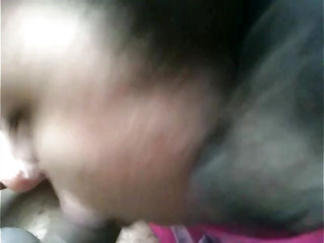 Big breasted amateur giving a car blowjob