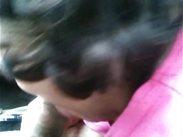 Big breasted amateur giving a car blowjob