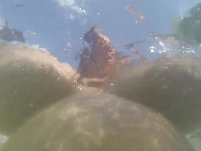 Solo by the pool with a huge titted redhead