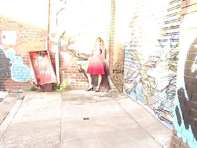 Pretty MILF in red reading and masturbating in public