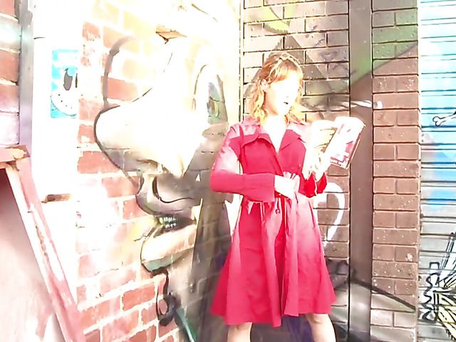 Pretty MILF in red reading and masturbating in public