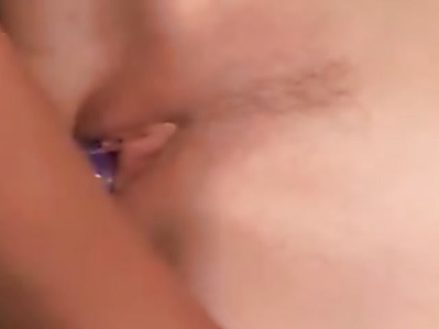 Lesbians play with handcuffs and a double dildo