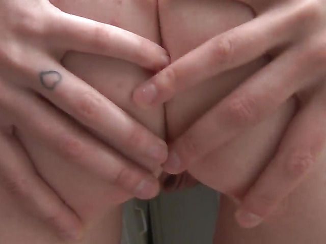 Ass cheeks spread and pussy exposed outdoors