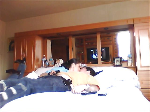 Latina girlfriend sucks cock dry on the bed