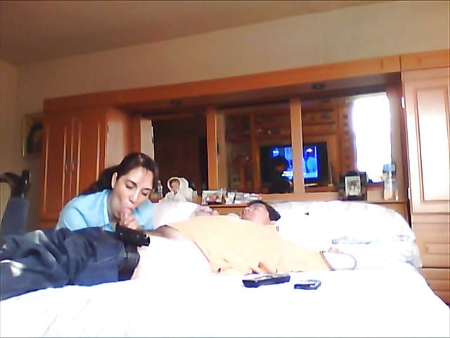 Latina girlfriend sucks cock dry on the bed