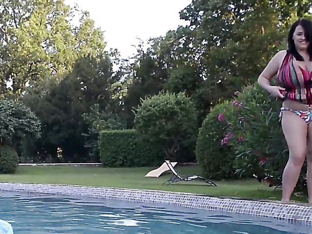 Huge tits women play with water guns topless