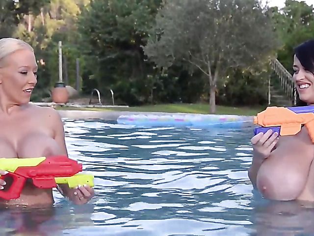 Huge tits women play with water guns topless