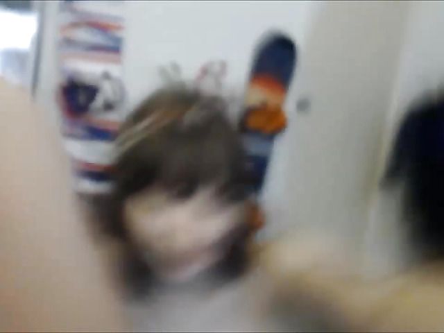 Amateur girl with lovely tits sucks a black dildo