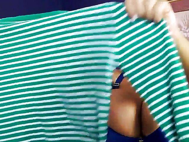 Amazing MILF displays her giant boobs and rubs her slit