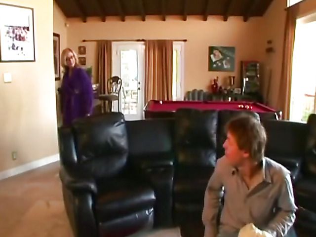 Lingerie-clad mature babe Nina Hartley fucking with a boy