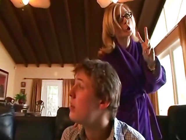 Lingerie-clad mature babe Nina Hartley fucking with a boy