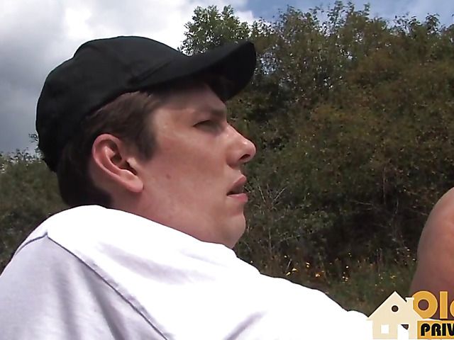 Busty granny takes on young cock in the outdoors