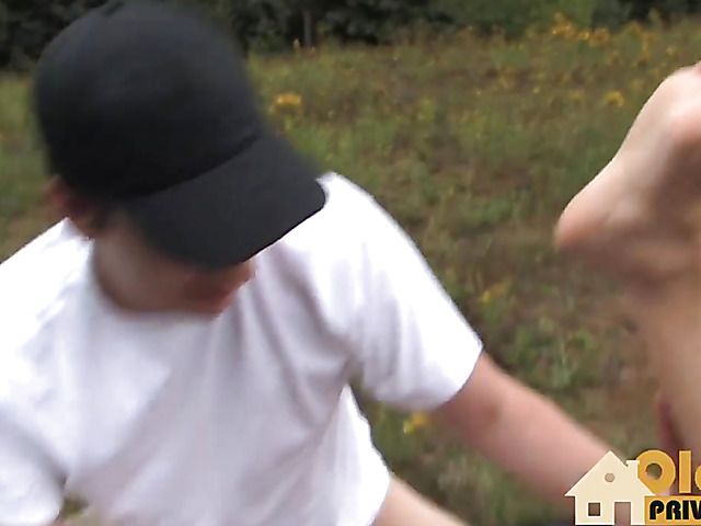 Busty granny takes on young cock in the outdoors