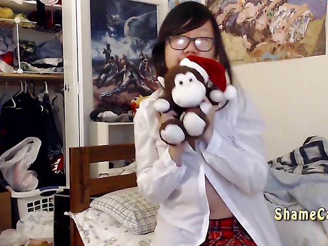 Asian schoolgirl Lily getting naked and masturbating