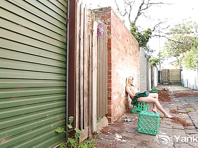 Two-faced girl fingering hairy pussy in the backstreet