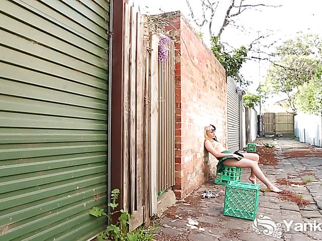 Two-faced girl fingering hairy pussy in the backstreet