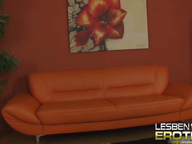 Stunning lesbian babes have sex on the couch