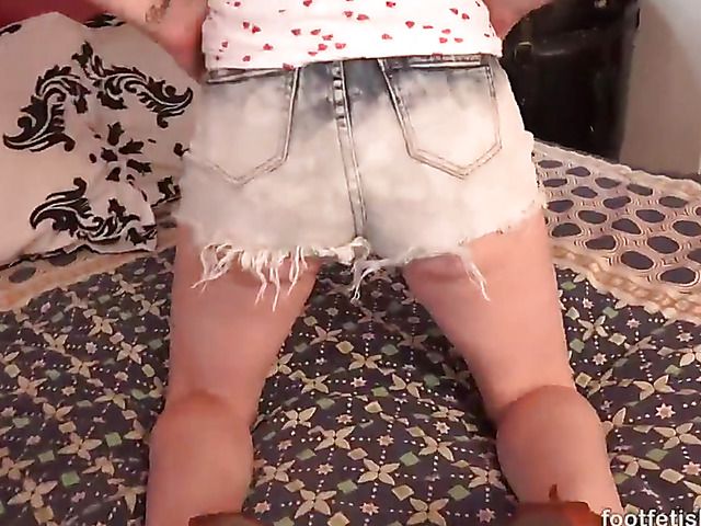 Interracial foot fetish fun with a blue hair girl