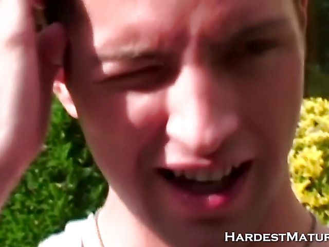 Redhead mature lady sucks a young dick