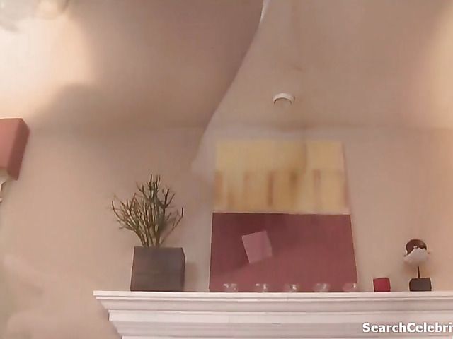 Hot lesbians make love by the fireplace